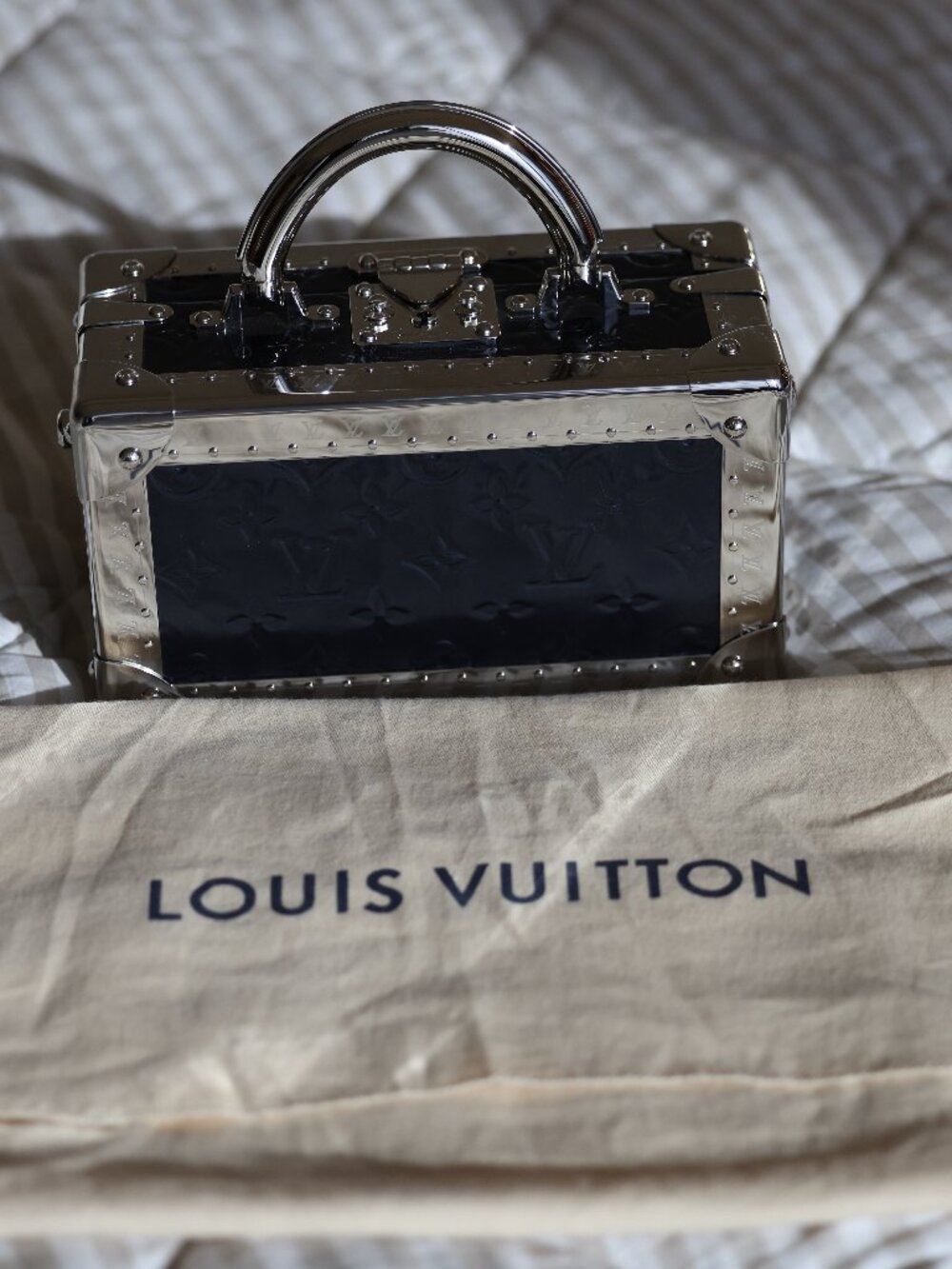 Louis Vuitton Monogram Valisette Tresor with a silver mirrored metallic finish